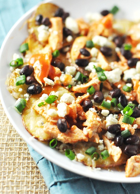 Nachos are usually made with tortilla chips, but I switched things up by making baked potato chip nachos.