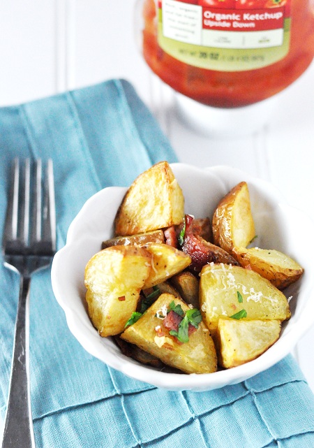 Roasted Red Potatoes with Bacon Garlic Parmesan recipes takes a standard potato side dish to a whole new level. If you do not eat bacon, simply substitute your favorite salty condiment.