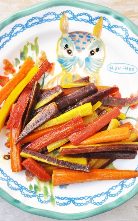 Roasting Tricolor Carrots are a simple way to see what differences in flavor exist between yellow, purple, or orange carrots.